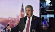 Britain's Secretary of State for Northern Ireland Brandon Lewis appears on BBC TV's The Andrew Marr Show in London, Britain October 25, 2020. Picture taken through glass. Jeff Overs/BBC/Handout via REUTERS