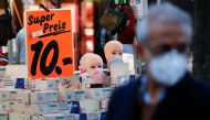 Face masks are on sale at Wilmersdorfer Strasse shopping street, as the coronavirus disease (COVID-19) outbreak continues, in Berlin, Germany, October 26, 2020. REUTERS/Fabrizio Bensch