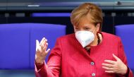 German Chancellor Angela Merkel wears a face mask as she attends a session of the German lower house of parliament Bundestag, as the spread of the coronavirus disease (COVID-19) continues in Berlin, Germany, October 29, 2020. REUTERS/Fabrizio Bensch
