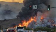 CHINO HILLS, CA - OCTOBER 27: Traffic is diverted off of the 71 freeway during the Blue Ridge Fire on October 27, 2020 in Chino Hills, California. Strong Santa Ana Winds gusting to more than 90 miles per hour have driven the Blue Ridge Fire and Silverado 