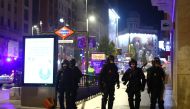 Police officers guard during a protest against the closure of bars and gyms, amidst the coronavirus disease (COVID-19) outbreak, in Madrid, Spain, November 1, 2020. REUTERS/Javier Barbancho