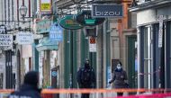 Police officers secure the area where multiple people were stabbed near the Parliament Hill area of Quebec City, Quebec, Canada November 1, 2020. REUTERS/Mathieu Belanger
