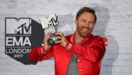 FILE PHOTO: French DJ David Guetta poses with his award during the 2017 MTV Europe Music Awards at Wembley Arena in London, Britain November 12, 2017. REUTERS//Hannah McKay/File Photo
