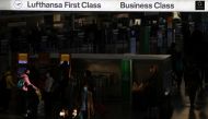 Passengers check in for the first and business class of German air carrier Lufthansa at Frankfurt Airport as the spread of the coronavirus disease (COVID-19) continues in Frankfurt, Germany, November 6, 2020. REUTERS/Kai Pfaffenbach
