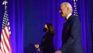 Democratic presidential nominee Joe Biden and Democratic vice presidential nominee Senator Kamala Harris walk off stage after Joe Biden delivered remarks at the Chase Center in Wilmington, Delaware, on November 6, 2020.   AFP / Angela Weiss