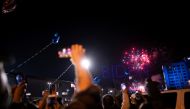 Supporters cheer during fireworks after U.S. President-elect Joe Biden delivered a victory speech, in Wilmington, Delaware, U.S. November 7, 2020. REUTERS/Mark Makela