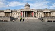 Police officers patrol in Trafalgar square in central London as England enters a second coronavirus lockdown on November 5, 2020. AFP / Hollie Adams