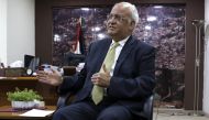 (FILES) A file photo taken on March 3, 2020 shows Saeb Erekat, Secretary-General of the Palestine Liberation Organisation and chief Palestinian negotiator, talking to reporters in the West Bank city of Ramallah. AFP / Abbas Momani 