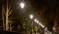 FILE PHOTO: A view shows the deserted Ile Saint Louis as the national lockdown starts as part of the COVID-19 measures to fight a second wave of the coronavirus disease (COVID-19), in Paris, France, October 30, 2020. REUTERS/Christian Hartmann/File Photo