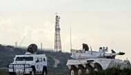 Vehicles of the UN Interim Force in Lebanon (UNIFIL) patrol the area near the southern Lebanese southernmost town of Naqura, by the border with Israel, on November 11, 2020. AFP / Mahmoud ZAYYAT