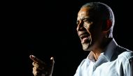 (FILES) In this file photo taken on November 02, 2020, former US President Barack Obama speaks at a drive-in rally as he campaigns for Democratic presidential candidate former Vice President Joe Biden in Miami, Florida. / AFP / CHANDAN KHANNA
