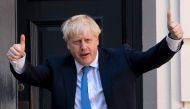 (FILES) In this file photo taken on July 23, 2019 new Conservative Party leader and incoming prime minister Boris Johnson arrives at the Conservative party headquarters in central London. On July 23, 2019, party members choose Brexit figurehead Boris John