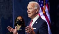 U.S. President-elect Joe Biden speaks about the U.S. economy as Vice President-elect Kamala Harris stands by following their briefing with economic advisers in Wilmington, Delaware, U.S., November 16, 2020. REUTERS/Kevin Lamarque
