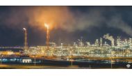A panoramic view of Mesaieed Industrial Area at night.