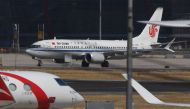 (FILES) This file photo taken on March 11, 2019 shows an Air China Boeing 737 MAX 8 plane at Beijing Capital Airport. China's aviation regulator said on November 20, 2020 it will not yet allow Boeing's troubled 737 MAX jet to fly in the company's biggest 