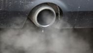 An exhaust emits fumes as a car is driven through Richmond in London, Britain December 2, 2016. REUTERS/Peter Nicholls/File Photo/File Photo