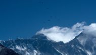 This file photo taken on March 26, 2020 shows Mount Everest (height 8,848 metres) from Namche Bazaar, the last stop before base camp in the shadow of the world's tallest mountain Everest. / AFP / PRAKASH MATHEMA