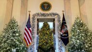 FILE PHOTO: The official White House Christmas tree is seen from the Cross Hall of the White House. REUTERS/Kevin Lamarque

