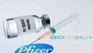 (FILES) Illustration file photo taken on November 23, 2020 showing a bottle reading 