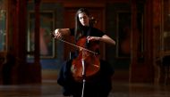 French-Belgian cellist Camille Thomas plays at the Musee des Arts Decoratifs, which is closed to visitors during the lockdown due to the spread of the coronavirus disease (COVID-19), in Paris, France, November 26, 2020. Picture taken November 26, 2020. RE