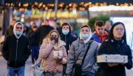 Shoppers walk with bags in the center of Rotterdam, on November 29, 2020. Shopkeepers in the city center, Alexandrium and Zuidplein have to close their doors at 5 pm, just like on November 28, 2020 because it is not possible to keep enough distance due to