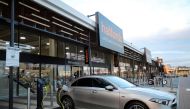 File photo: An electric car is seen at a charging point at Halfords in Rugby, Britain, November 19, 2020. REUTERS/Molly Darlington/File Photo