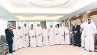 Chairman of the Qatari Businessmen Association, Sheikh Faisal bin Qassim Al Thani; Second-Deputy Sheikh Dr. Khalid bin Thani Al Thani and other members of the association posing for a group photo.