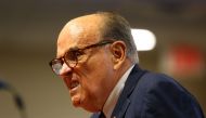 LANSING, MI - DECEMBER 02: U.S. President Donald Trump's personal attorney Rudy Giuliani speaks during an appearance before the Michigan House Oversight Committee on December 2, 2020 in Lansing, Rey Del Rio/Getty Images/AFP