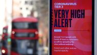 A British government health information advertisement highlighting new restrictions amid the spread of the coronavirus disease (COVID-19) is seen in London, Britain, December 19, 2020. REUTERS/Toby Melville
