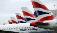 This file picture taken on March 29, 2010 shows British Airways aircraft sitting parked at London Heathrow Airport during the third day of a four-day strike. AFP / Adrian DENNIS