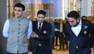 Sourav Ganguly (L), Board of Control for Cricket in India (BCCI) president, Jay Shah, Secretary of the BCCI (R) and Arun Dhumal (C), BCCI treasurer, leave after attending the Annual General Meeting (AGM) of the BCCI at Skyline Taj Hotel on the outskirts o