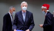 European Union's chief Brexit negotiator Michel Barnier holds the pages of the Brexit trade deal as he attends a meeting of the Committee of the Permanent Representatives of the Governments of the Member States to the European Union in Brussels, Belgium D