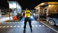 Control patrols and vehicles at the border crossing on the Oresund Bridge, which connects Denmark and Sweden (Copenhagen and Malm?).  AFP  / Johan NILSSON