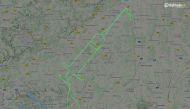 A flightradar24.com handout photo received on December 27, 2020 shows the flight track for a D-ENIG plane that traced a syringe on the maps in Germany to celebrate the arrival of a COVID-19 vaccine. The flight between Friedrichshafen and Ulm took place on