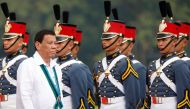 Philippines President Rodrigo Duterte reviews military cadets during change of command ceremonies of the Armed Forces of the Philippines (AFP) at Camp Aguinaldo in Quezon City, metro Manila, Philippines October 26, 2017. REUTERS/Dondi Tawatao/File Photo