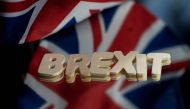 This file photograph taken on December 10, 2020, shows the flags of the United Kingdom and the European Union next to the 