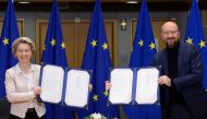 European Commission President Ursula von der Leyen and European Council President Charles Michel show signed Brexit trade agreement due to come into force on January 1, 2021, in Brussels, Belgium December 30, 2020. REUTERS/Johanna Geron/Pool
 