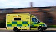 An ambulance is seen driving following the coronavirus disease (COVID-19) outbreak in London, Britain, January 2, 2021. REUTERS/Toby Melville