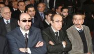 FILE PHOTO: (L-R) Lebanese musicians and composers Ousama Rahbani, Elias Rahbani and Ziad Rahbani attend the funeral of composer, musician and producer Mansour Rahbani in Beirut January 16, 2009. REUTERS/Mohamed Azakir/File Photo
