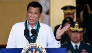 FILE PHOTO: Philippine President Rodrigo Duterte gestures during the change of command ceremony of the Armed Forces of the Philippines (AFP) at Camp Aguinaldo in Quezon City, Metro Manila, Philippines April 18, 2018. REUTERS/Dondi Tawatao/File Photo
