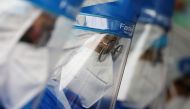 Medical personnel work at a testing station amid the coronavirus disease (COVID-19) outbreak in Shah Alam, Malaysia January 7, 2021. REUTERS/Lim Huey Teng