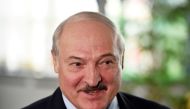 FILE PHOTO: Belarusian President Alexander Lukashenko visits a polling station during the presidential election in Minsk, Belarus August 9, 2020. Sergei Gapon/Pool via REUTERS