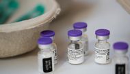 Vials of the Pfizer-BioNTech COVID-19 vaccine are seen at a coronavirus disease vaccination center inside a gymnasium in Taverny near Paris, France, January 9, 2021. REUTERS/Benoit Tessier
