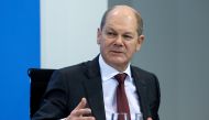 FILE PHOTO: German Finance Minister Olaf Scholz attends a news conference following talks with state leaders to discuss anti-coronavirus measures at the Chancellery in Berlin, Germany December 13, 2020. Bernd von Jutrczenka/Pool via REUTERS