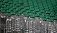 FILE PHOTO: Vials of AstraZeneca's COVISHIELD, coronavirus disease (COVID-19) vaccine, are seen before they are packaged inside a lab at Serum Institute of India, Pune, India, November 30, 2020. REUTERS/Francis Mascarenhas/File Photo
