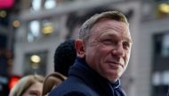 Actor Daniel Craig reacts during a promotional appearance on TV in Times Square for the new James Bond movie 
