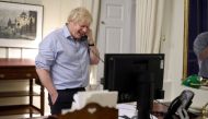 British Prime Minister Boris Johnson speaks to U.S. President Joe Biden from London, Britain, in this social media image obtained on January 23, 2021. Mandatory credit DOWNING STREET HANDOUT /Crown copyright 2021/via REUTERS