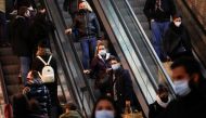 Shoppers ride escalators amid the coronavirus disease (COVID-19) outbreak, in Madrid, Spain January 22, 2021. REUTERS/Susana Vera
