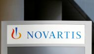 The logo of Swiss drugmaker Novartis is pictured at the French company's headquarters in Rueil-Malmaison near Paris, France, April 22, 2020. REUTERS/Charles Platiau/File Photo GLOBAL BUSINESS WEEK AHEAD