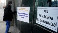 A man arrives at the Javits Center to get a vaccine in the Manhattan borough of New York City, New York, U.S., January 25, 2021. REUTERS/Carlo Allegri
